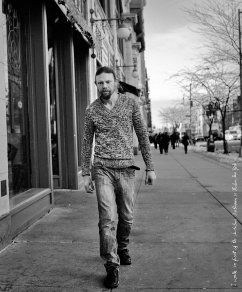I walk in front of the Audubon Ballroom in Harlem, New York