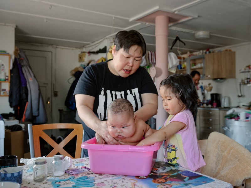 Meqo and Malu washing William, Savissivik